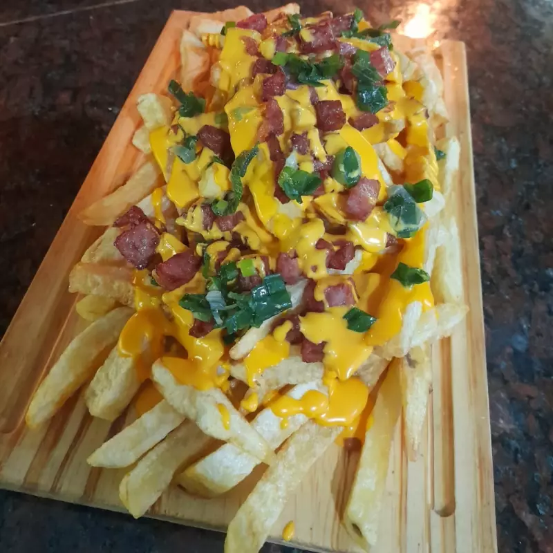 Papas Cheddar, Panceta y Verdeo