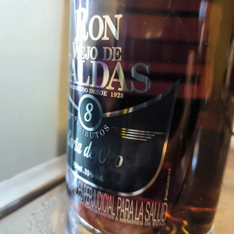 Ron Caldas 8 años - Carta Oro