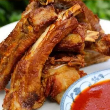 Costilla Frita Guisada