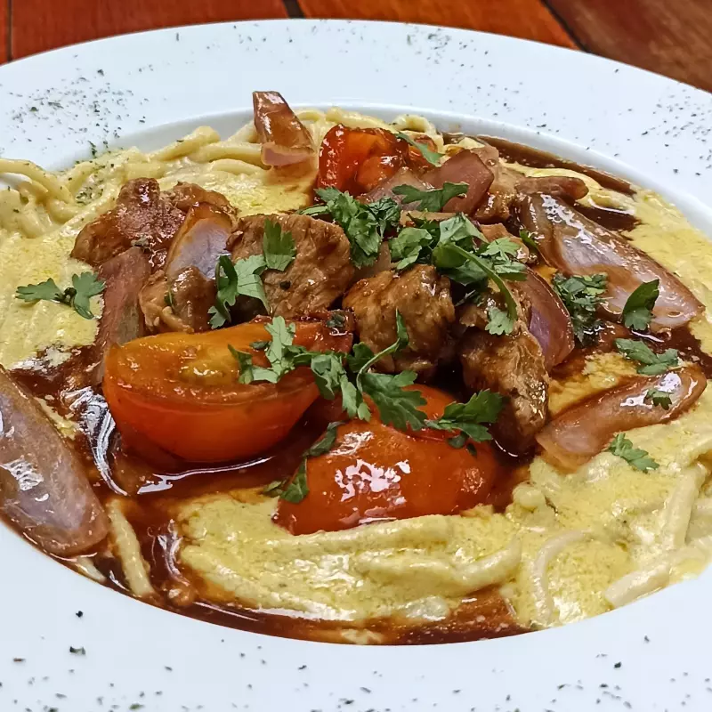 Spaghetti Huancaína C Cerdo Saltado