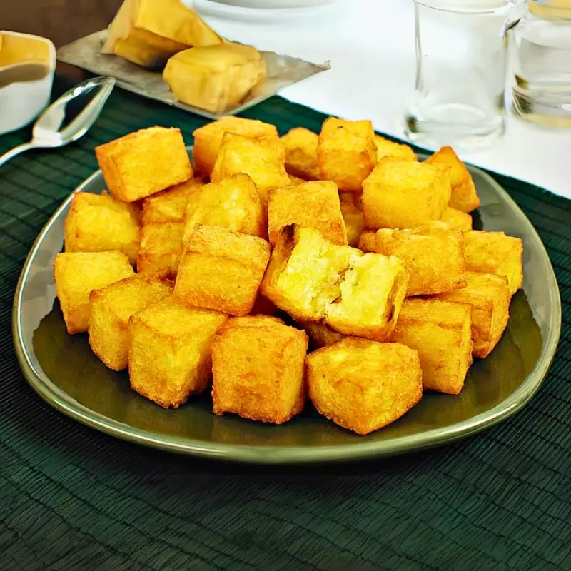 PORÇÃO DE MANDIOCA FRITA