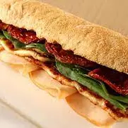 Baguete de rúcula e tomate seco