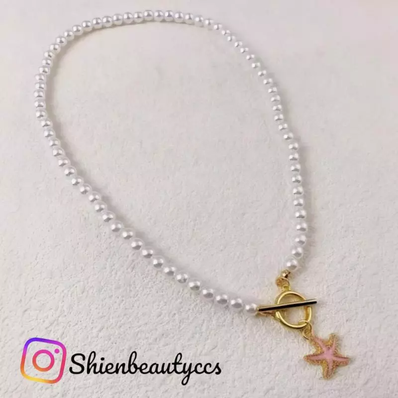 Collar perlas y estrella