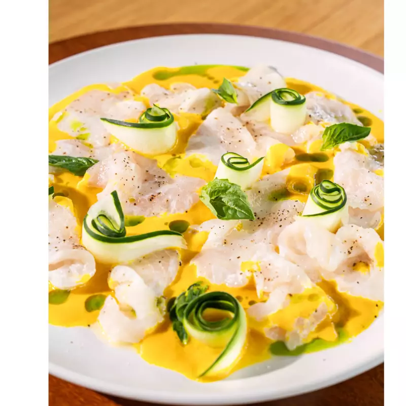 Tiradito de Paiche en aji amarillo
