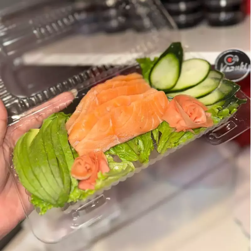 50.- Sashimi de Salmón