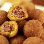 Bolinho de abóbora com carne de sol