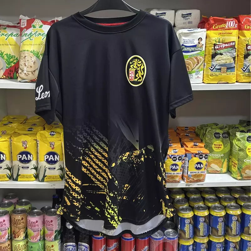 Franela Leones líneas amarillas DAMA