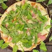 • Pizza de Rúcula