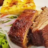 Lechón al Horno con Pastel de Papa