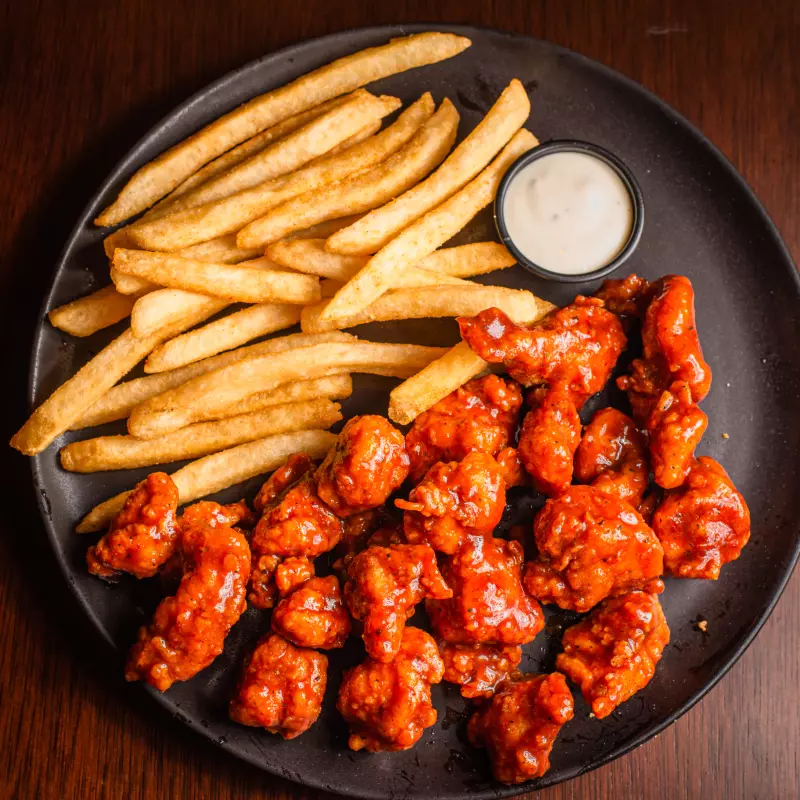 Chicken Trumps 12 Onzas + Papas