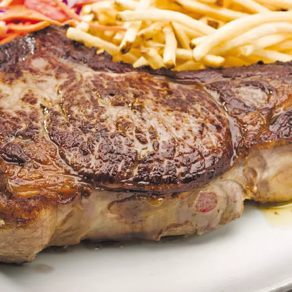 Bife de costilla c/guarnicion