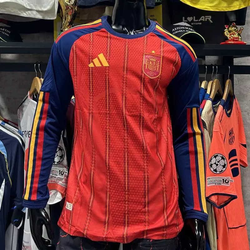 España local player manga larga 2026