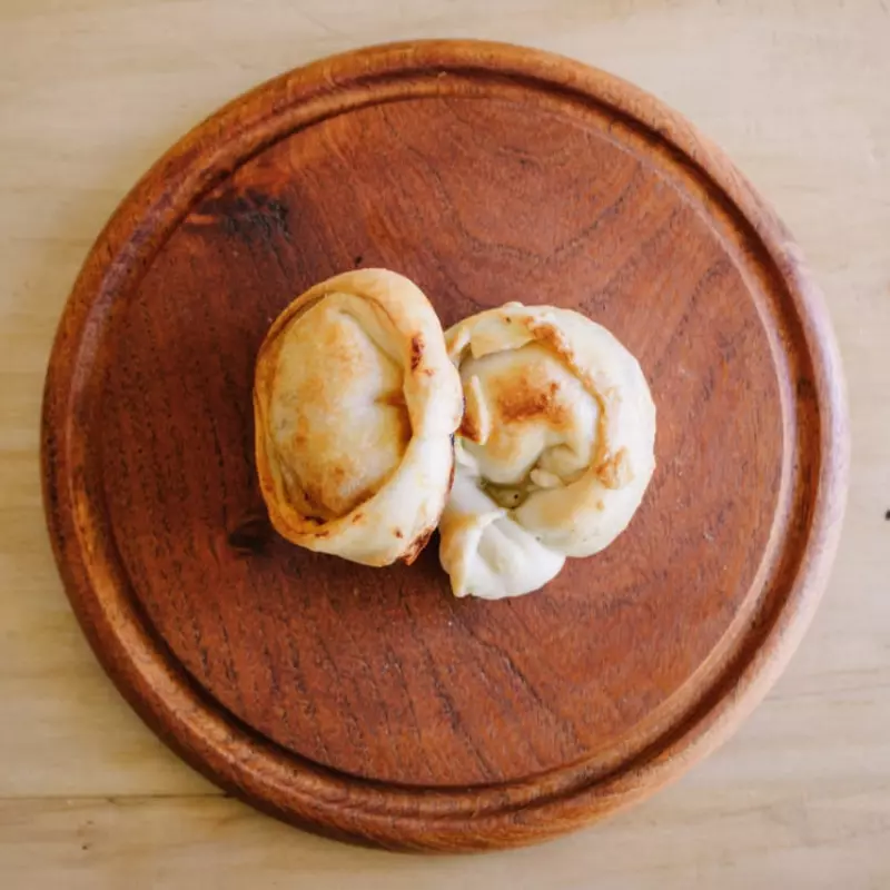 1/2 Doc Empanada de Queso y Puerro