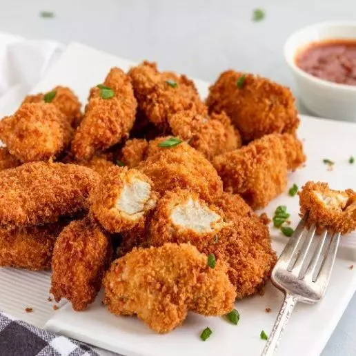 Nuggets de Pollo con Papas Fritas