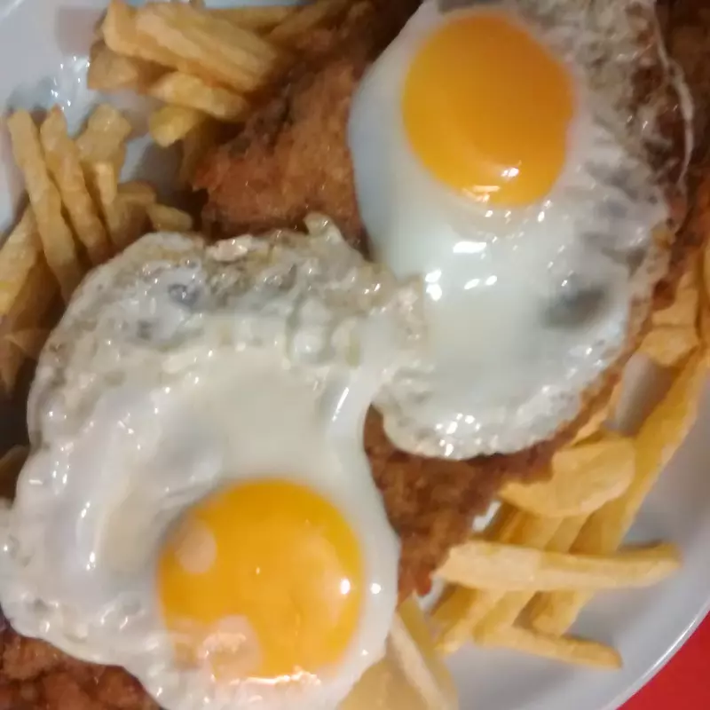 Milanesa o suprema  a caballo