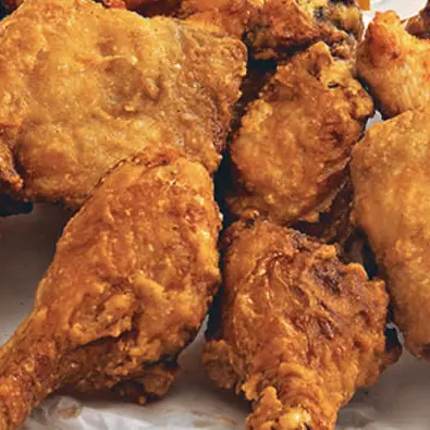 Coxa e sobrecoxa empanada e frita
