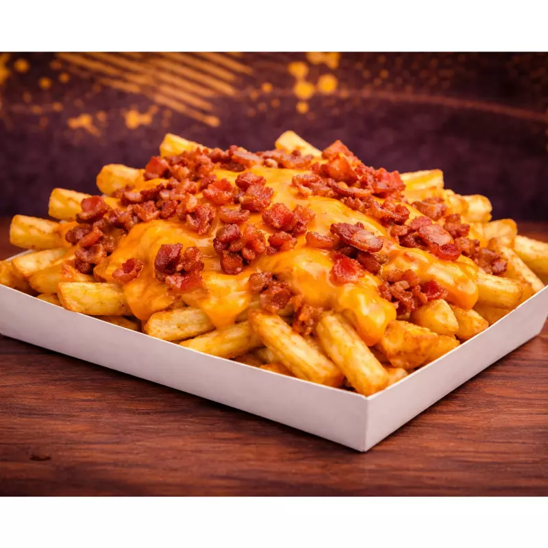 PAPAS FRITAS CON CHEDDAR & PANCETA