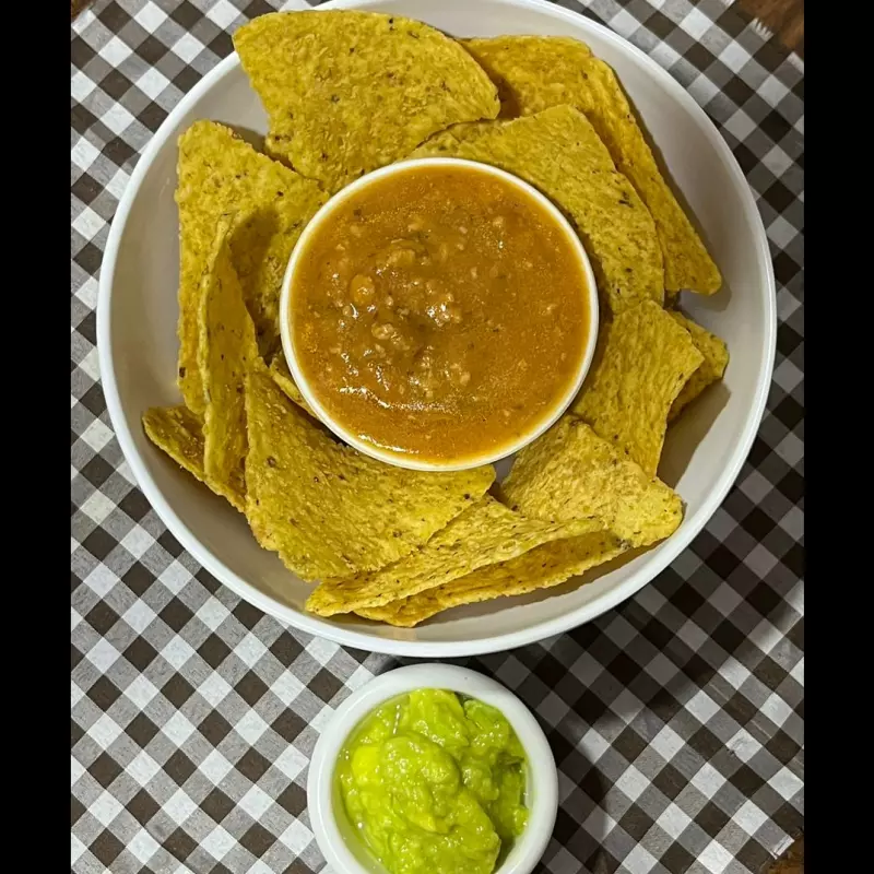NACHOS CON BOLOGNESA