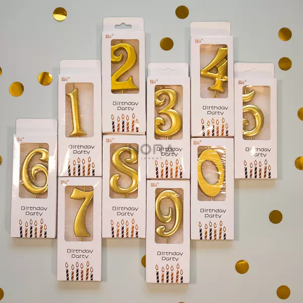 Velas numéricas doradas o plateadas