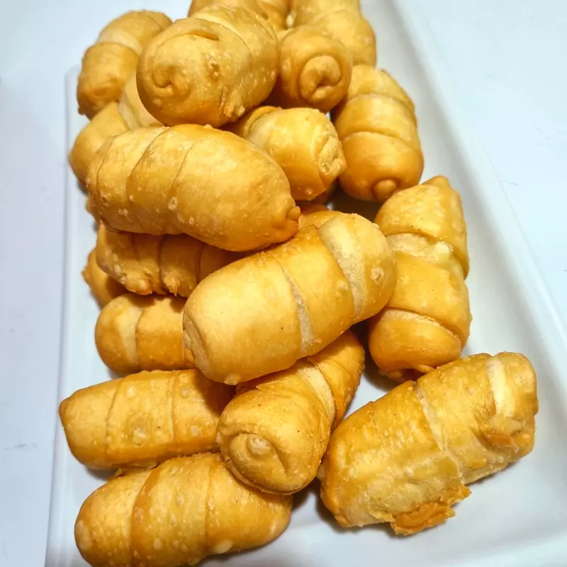 24 tequeños de queso (5cm) + 1 salsa