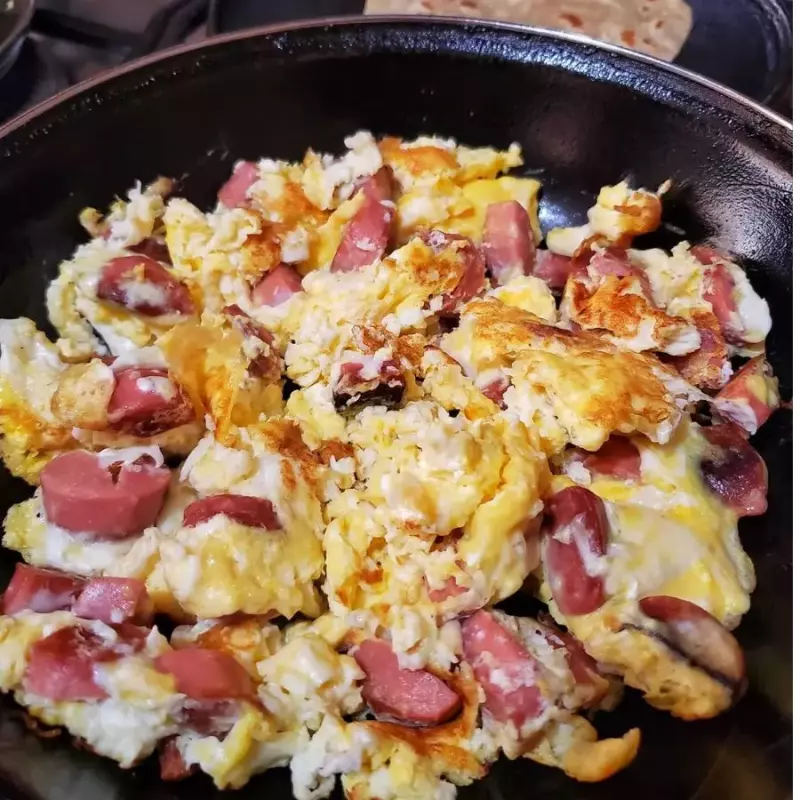 Porción de huevos rancheros