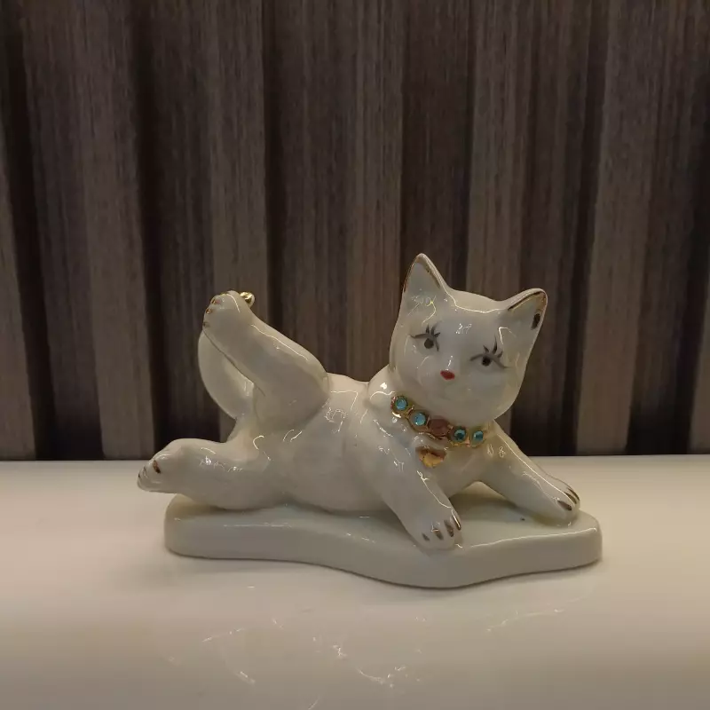 GATO ACOSTADO PORCELANA