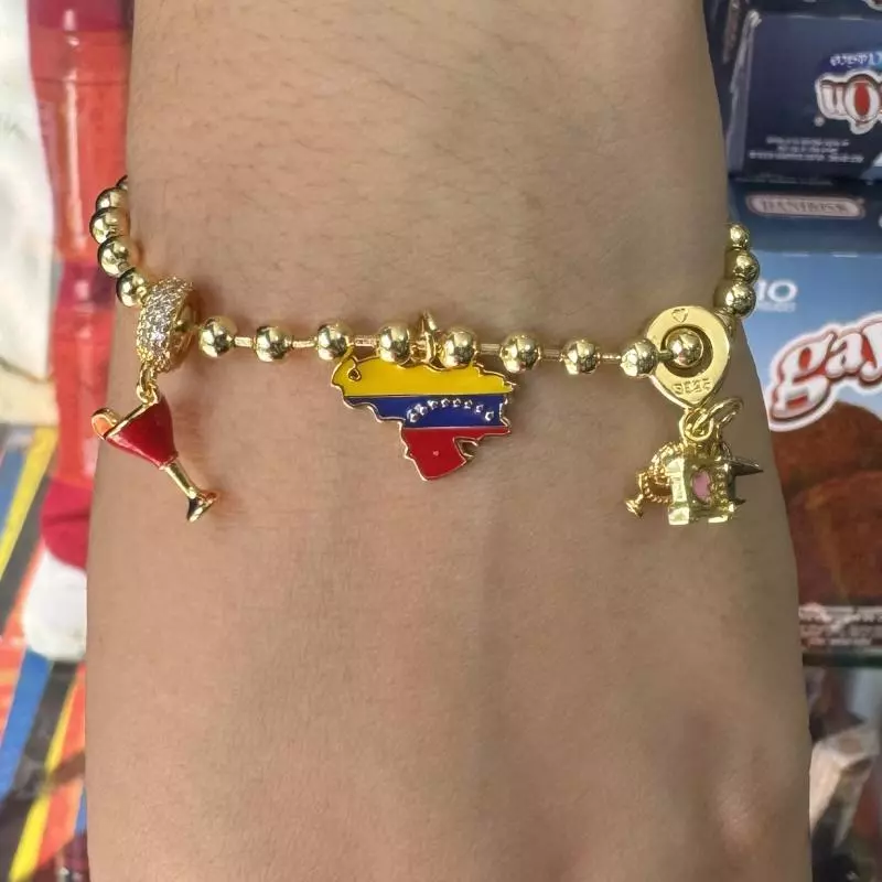 Pulsera 3 dijes mapa copa viaje