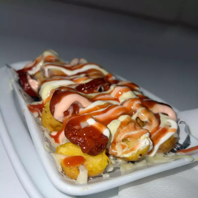 Salchipapa con papa criolla