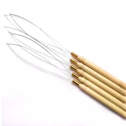 Enhebrador para anillos de extencion