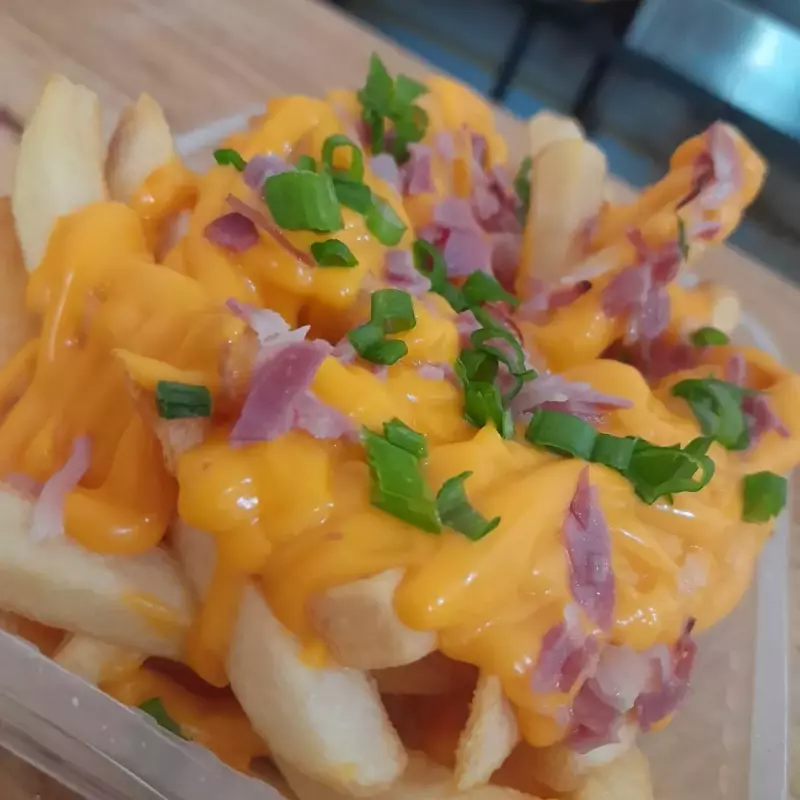 Papas fritas cheddar