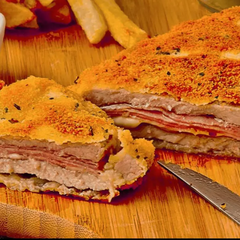 Milanesa Rellena c/Guarnición