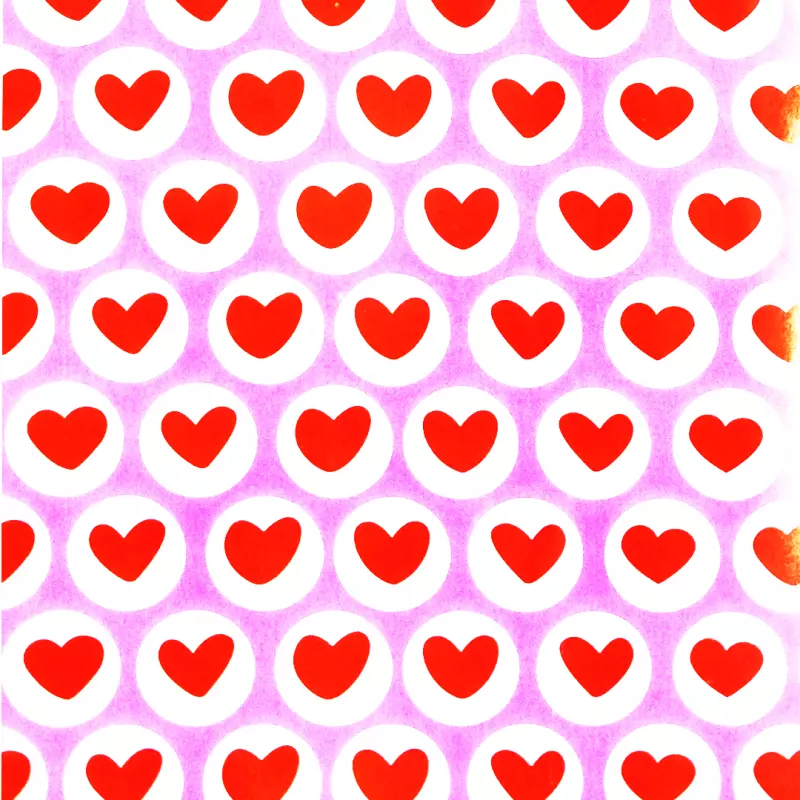 PAPEL DE REGALO CORAZON FONDO MORADO