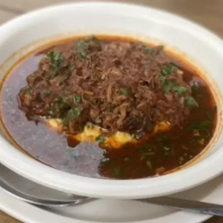 Dorado ahogado con queso