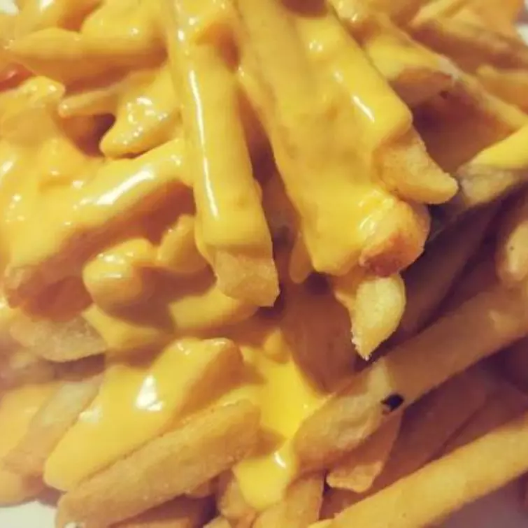 PAPAS FRITAS con CHEDDAR