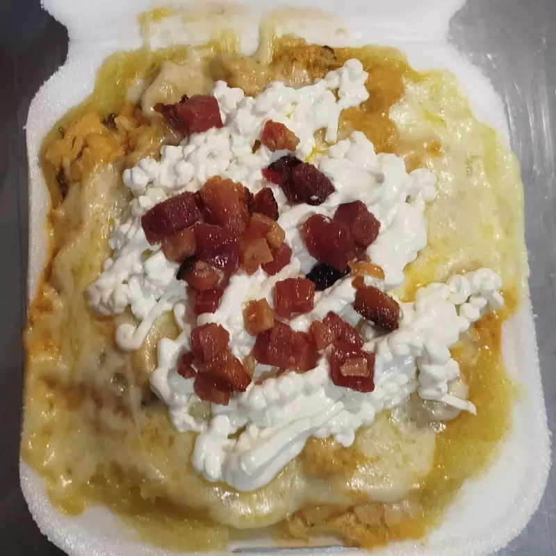 Batata recheada de Strogonoff frango