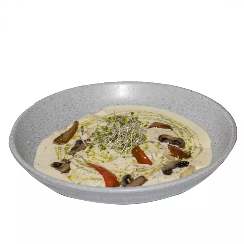 Ravioles en bechamel de lomo saltado