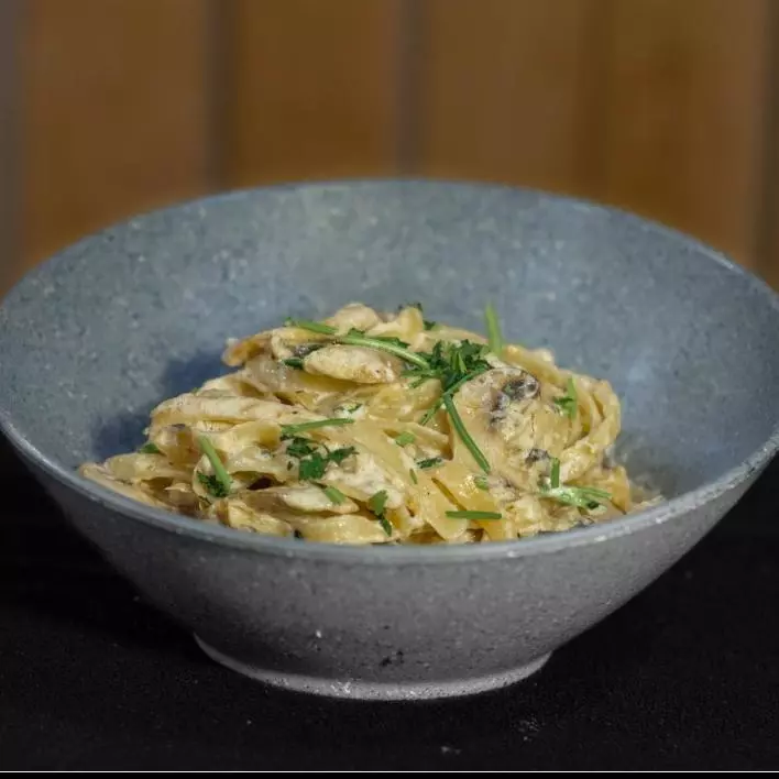 Fettuccini con champiñones