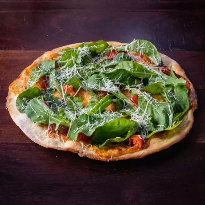 Pizza rúcula y provolone 4 porc.