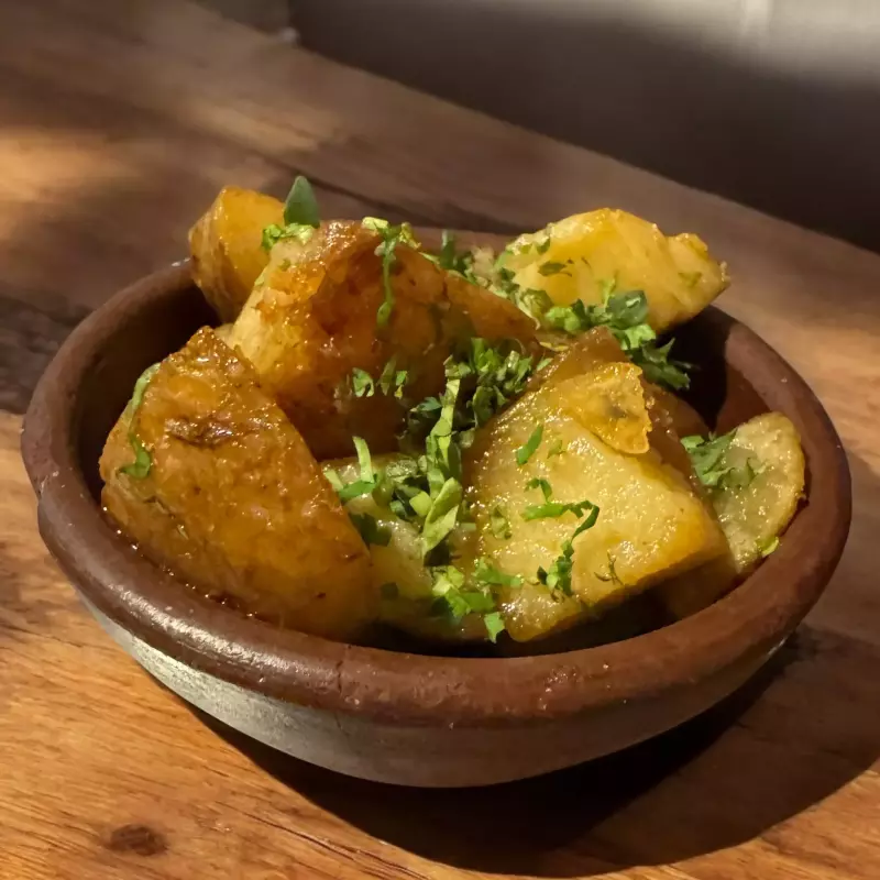 PAPAS SALTEADAS AL CILANTRO