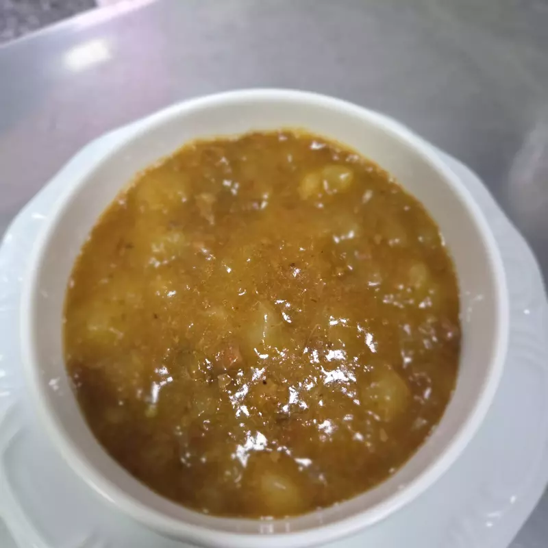 Aipim cremoso com carne de panela