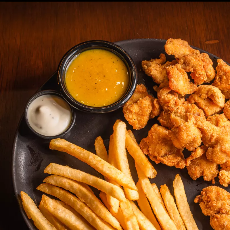 Chicken Trumps 6 Onzas + Papas