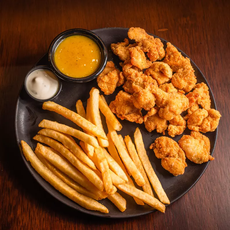 Chicken Trumps 18 Onzas + Papas