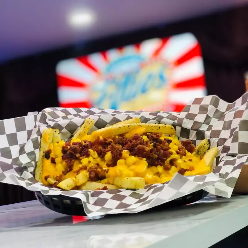 PAPAS CON ELOTITO, QUESO Y TOCINO