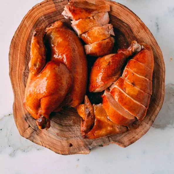 Pollo “Wat cay” (medio pollo asado)