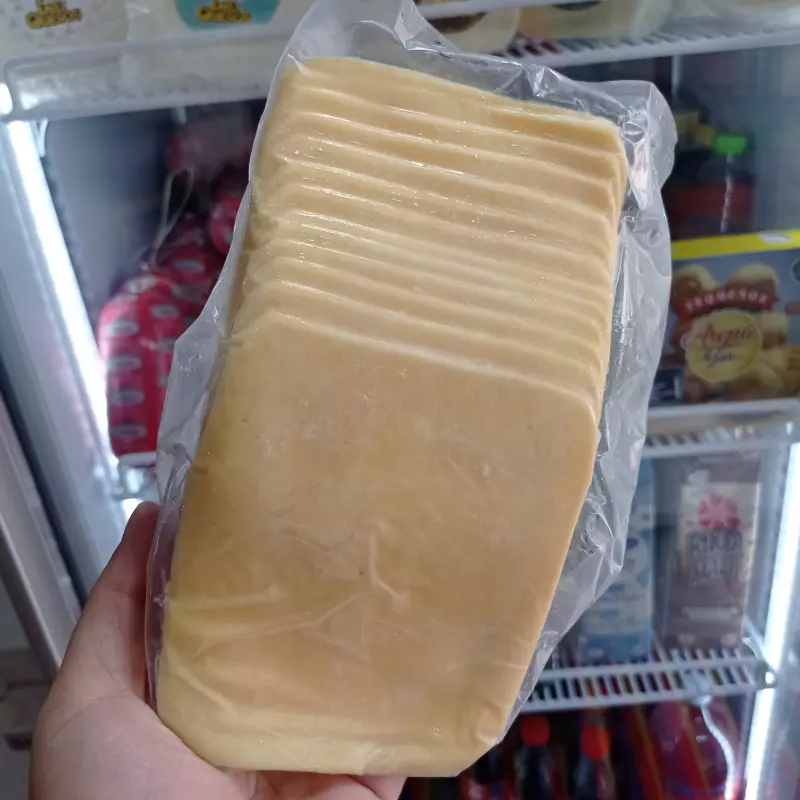Queso amarillo rebanado