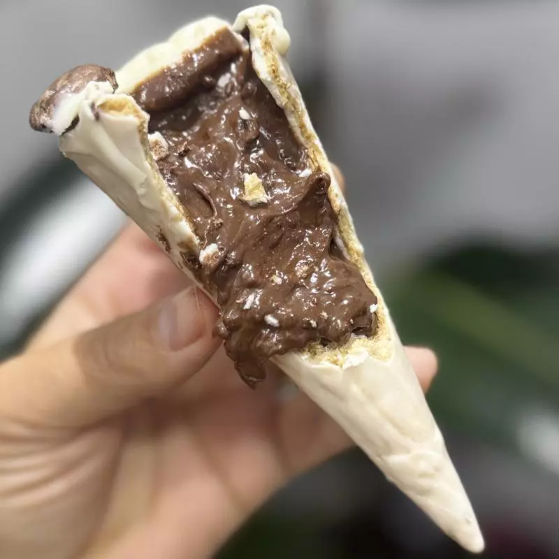 Cone Ovomaltine casq Branca