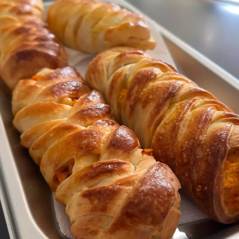PÃO TRANÇADO DE PRESUNTO E MUSSARELA
