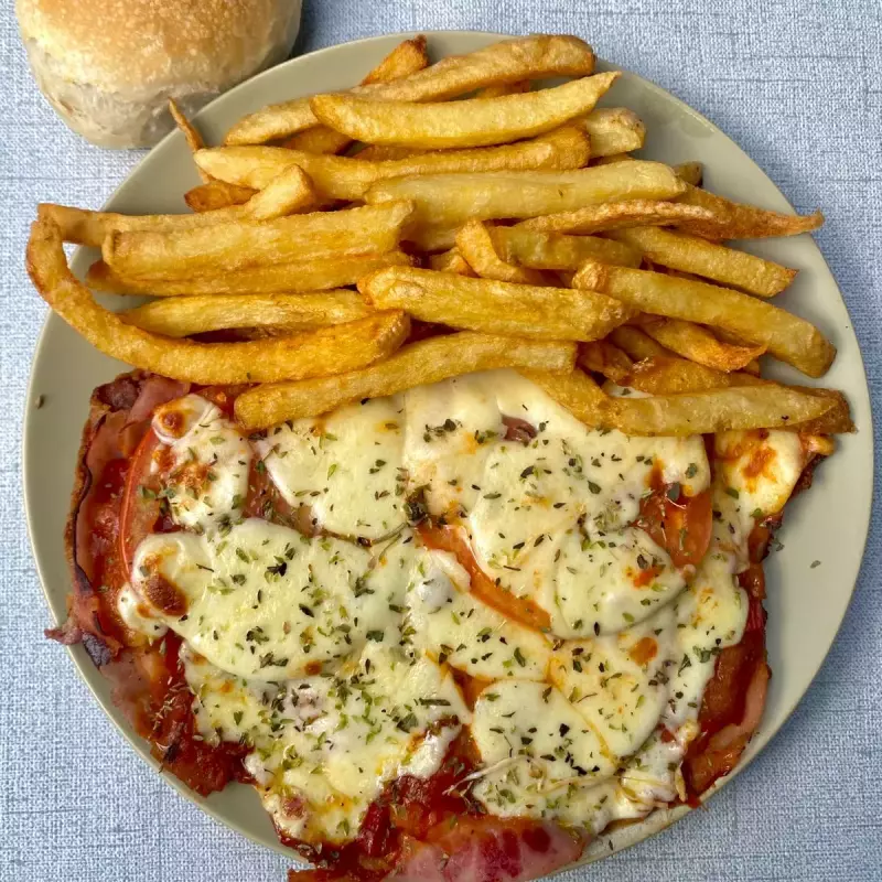 Milanesa napolitana con papas fritas