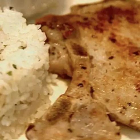 Chuleta con arroz