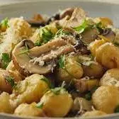 Nhoque ao molho de cogumelos